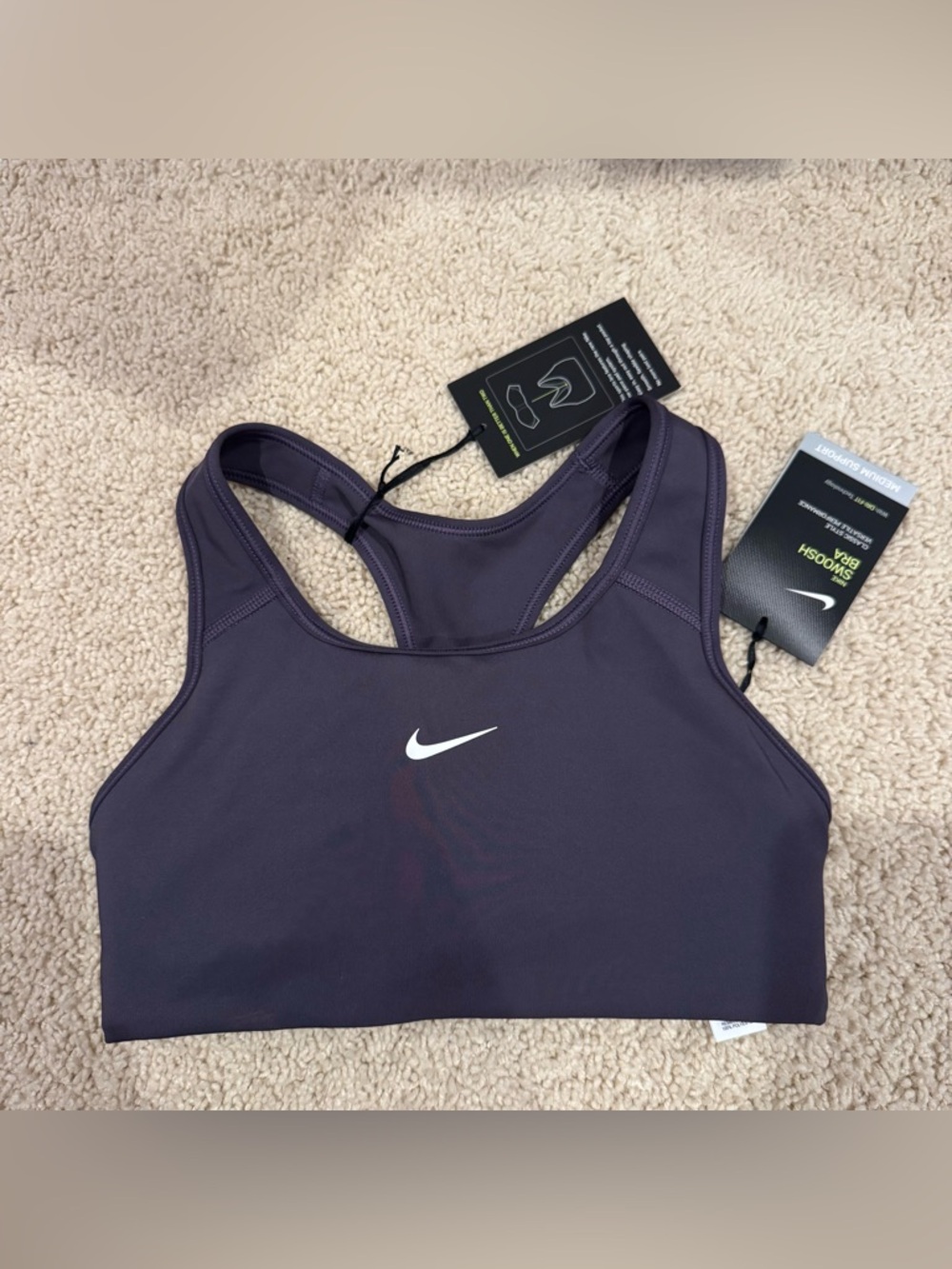 Purple nike sports bra. Size XS. Brand new with tags!!